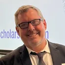 Greg Llacer headshot